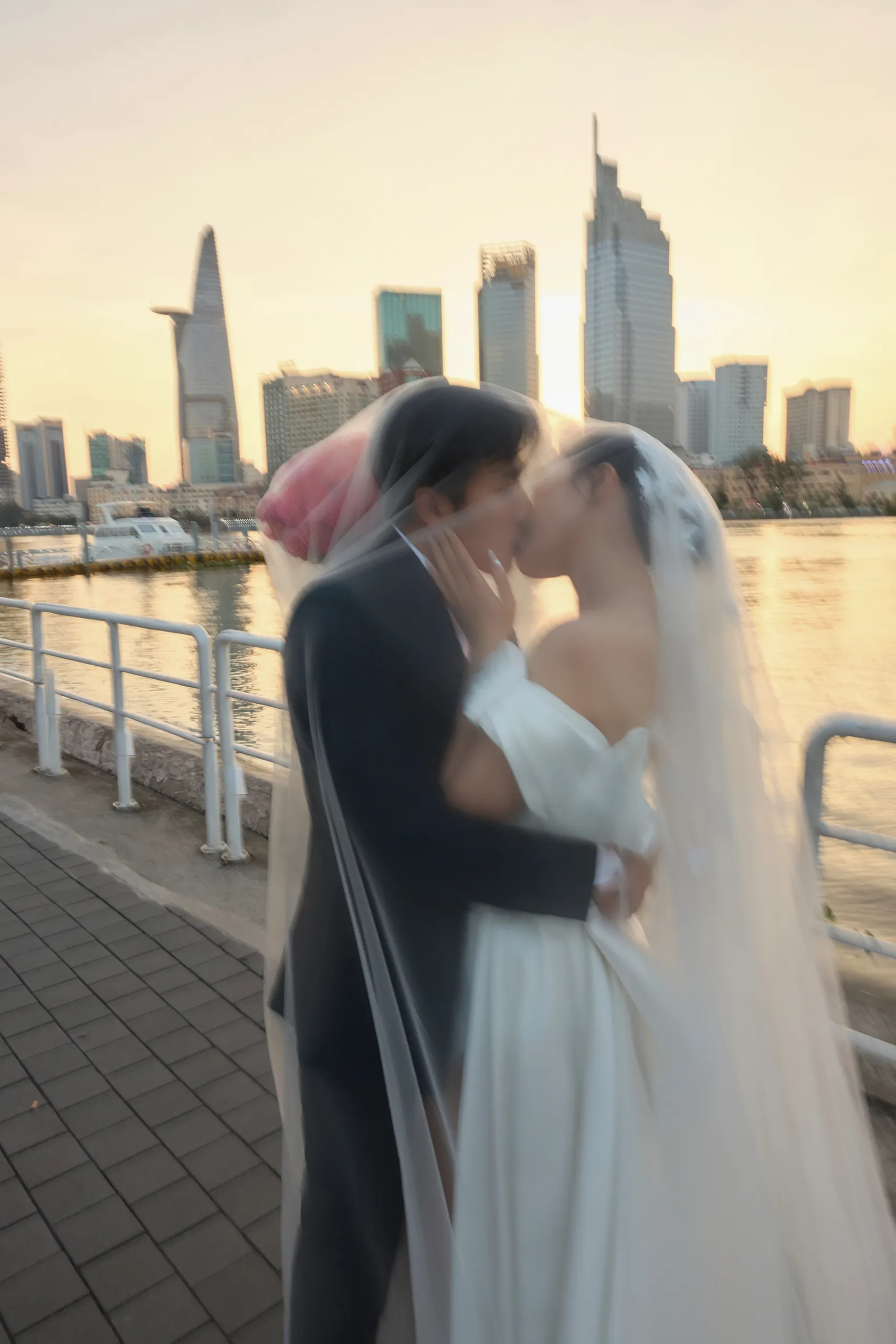 Romantic kiss by Saigon river